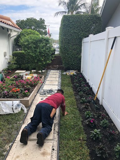 King Landscaping crew installing a landscape border